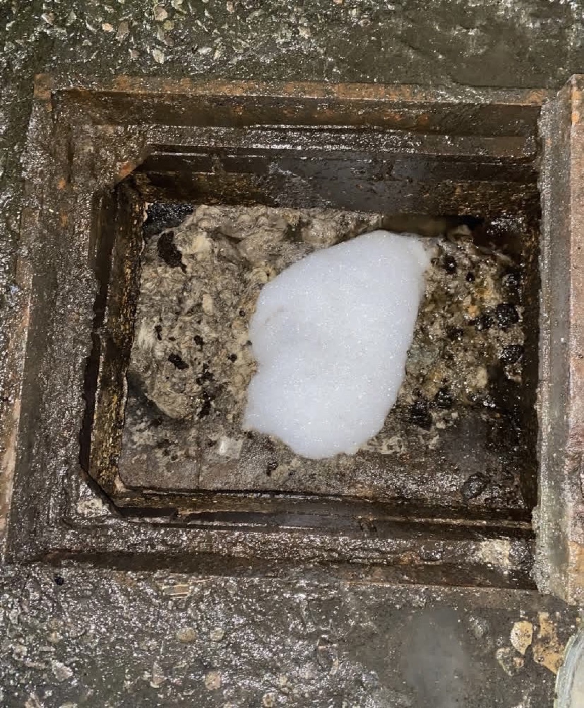 Before blocked drain chamber cleaning with heavy fat grease and debris build up