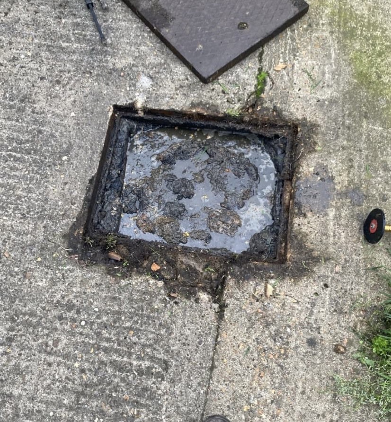 Before inspection chamber cleaning with standing dirty water and sludge